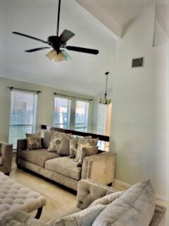 Living Room showing vaulted ceiling
