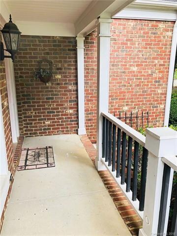 Adorable rocking chair front porch.