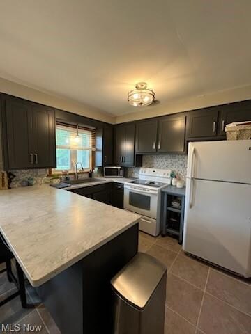 Kitchen comes fully applianced! Vinyl tile flooring.