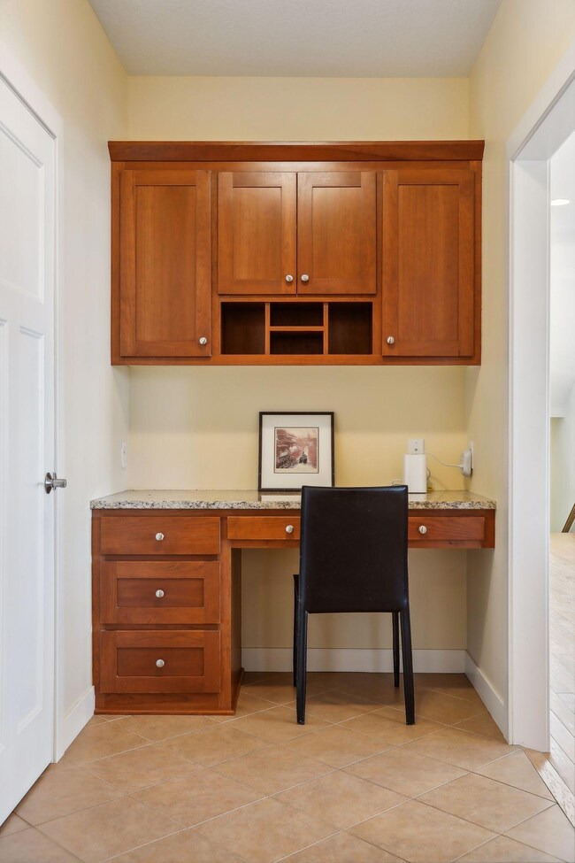 Convenient workstation located in Mud Room