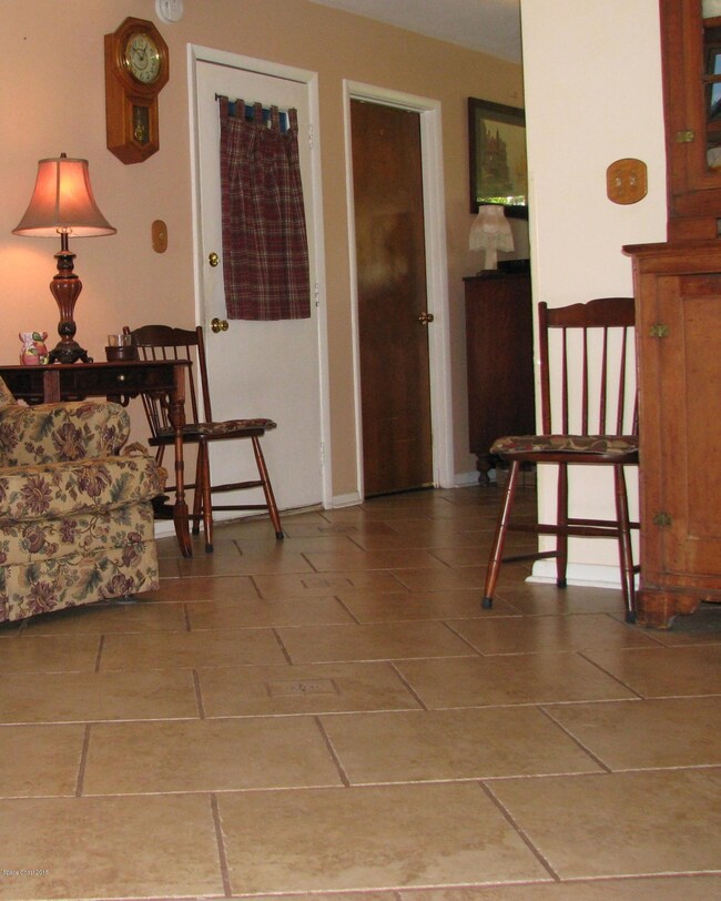 3 Front room showing entrances to garage