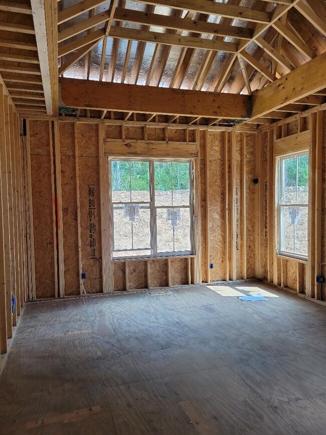 Primary bedroom suite is on the main level along with one other bedroom.  Primary bath has double vanities, large walk-in, separate ceramic shower, and elegant standalone tub.  Look at the gorgeous ceiling lines!