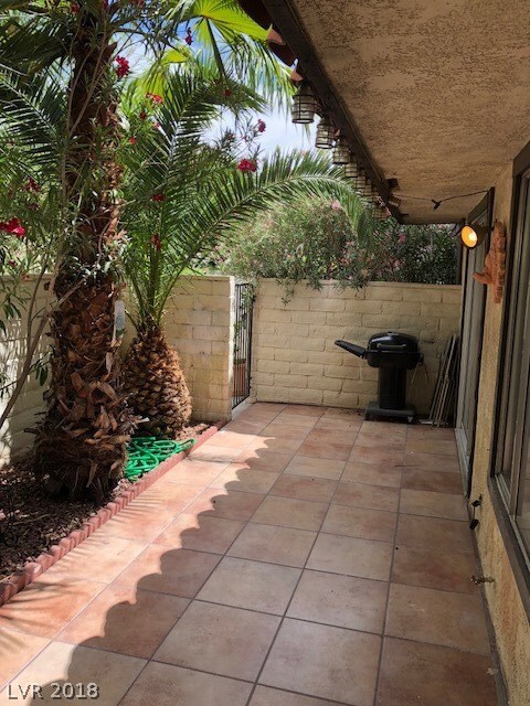 BBQ area fully landscaped courtyard style side yar