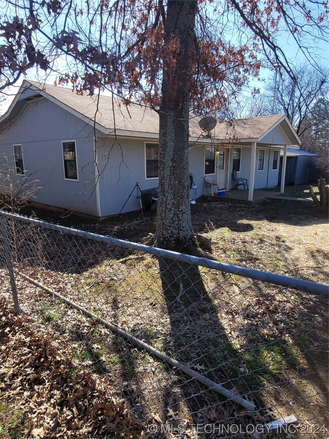 House fenced around house completely