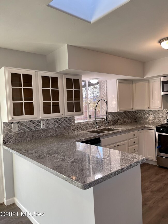 Granite countertops/designer backsplash