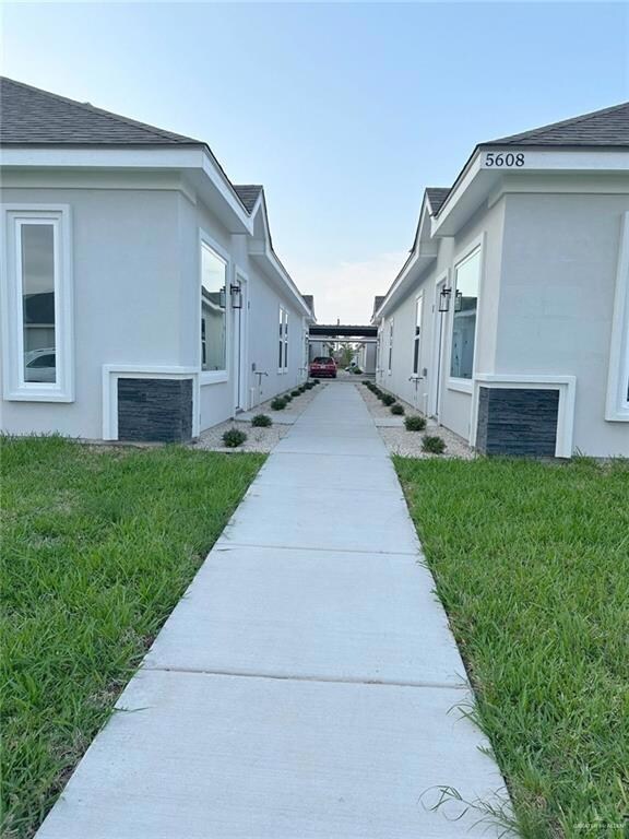 View of home's exterior featuring a yard