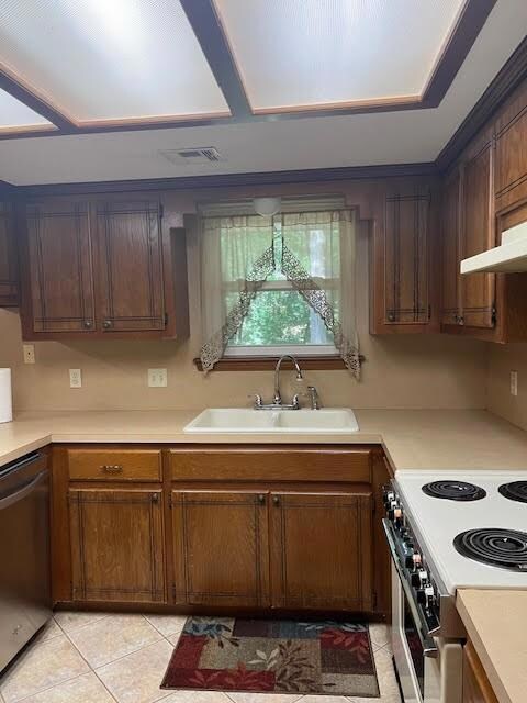 Kitchen featuring sink, stainless steel appliances
