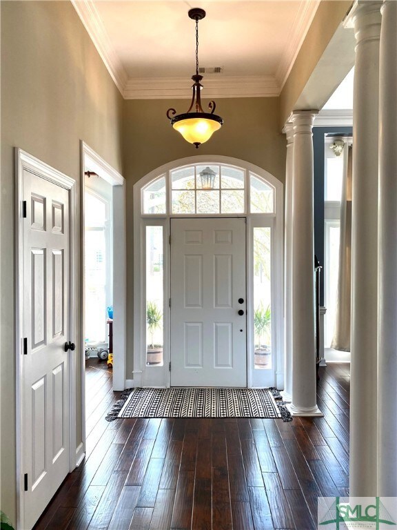 Foyer entrance with office to your left and formal