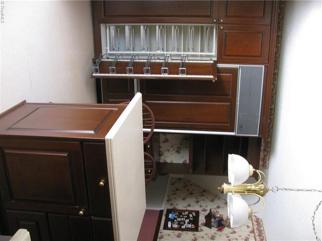 Custom Kitchen cabinets and refrigerator with cabinet doors