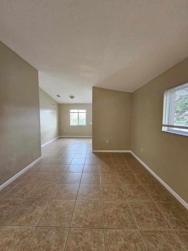 3490 Briar Bay Blvd unit 206, West Palm Beach, FL 33411 - photo 4