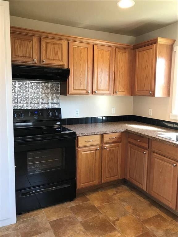 New stove, cabinets, counters, fixtures and floori