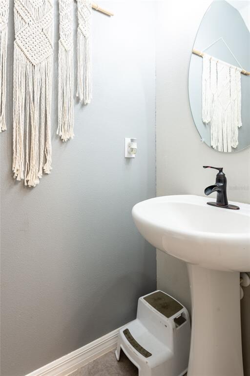 The half bath has an upgraded faucet!