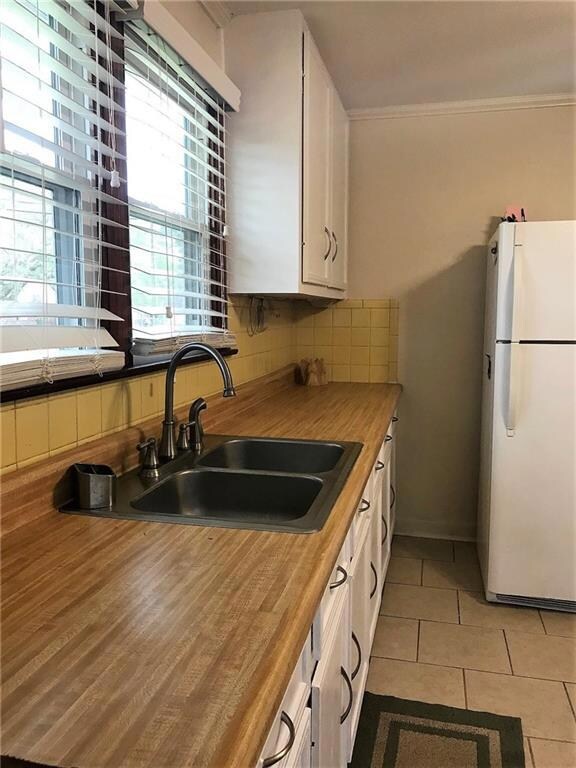 Currently the kitchen has several cabinets for sto