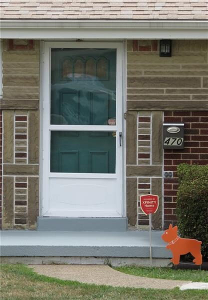 Quality abounds in this home starting at the detailed brick and stone work.