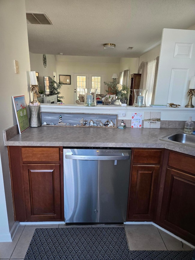 Kitchen has stainless steel appliances