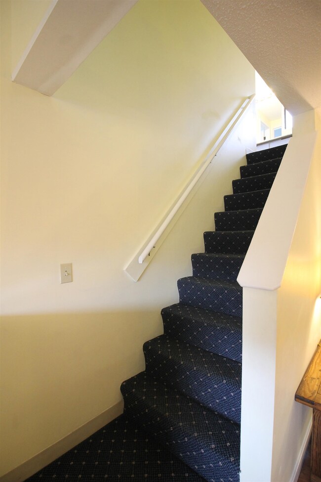 Upstairs to sleeping spaces