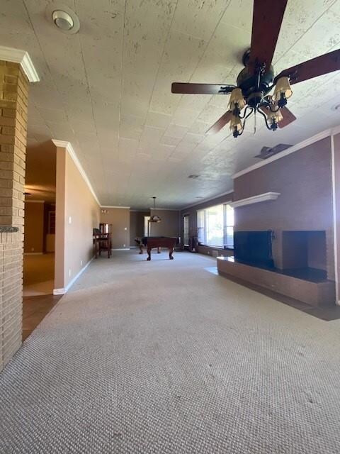 Playroom with ornamental molding, billiards table, and carpet floors