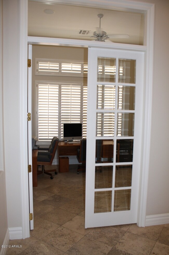 Beveled Glass French Doors Lead to Den