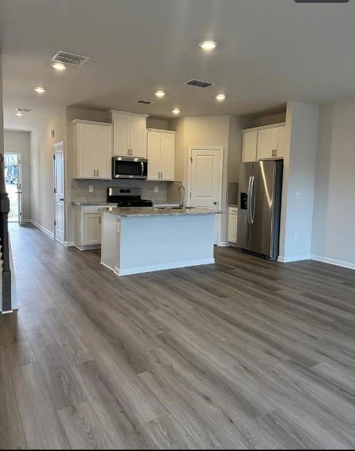 Kitchen featuring stainless steel appliances, visi