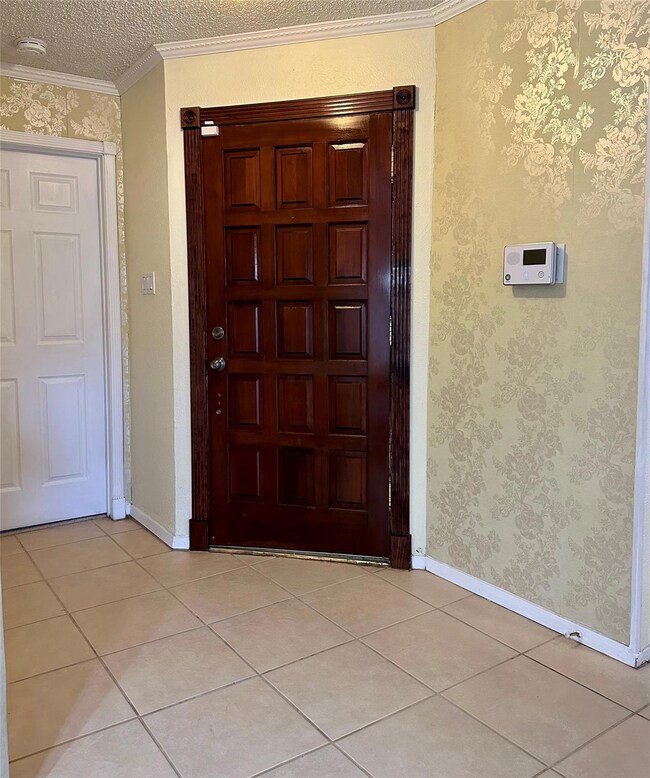View of front door from the interior spacious entr