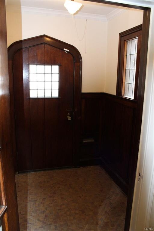 Front door entrance with lots of natural lighting 