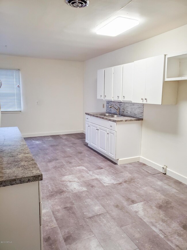 Kitchen with new vinyl plank flooring
