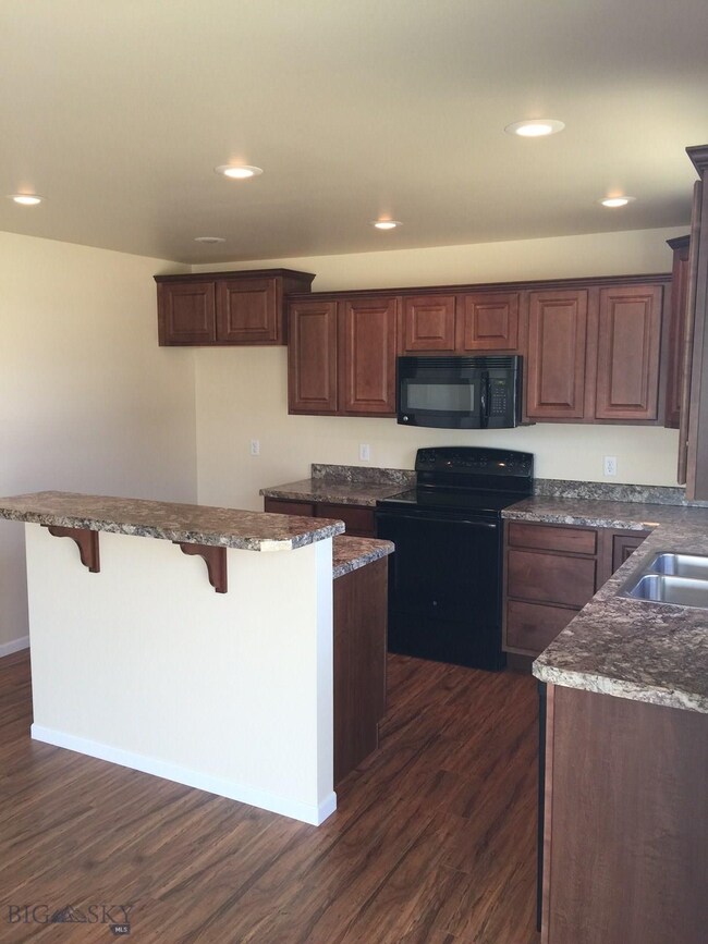 Kitchen. Photo of similar home.