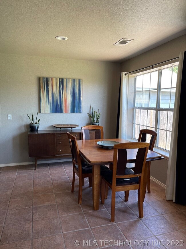 Dining area is open to kitchen and living area