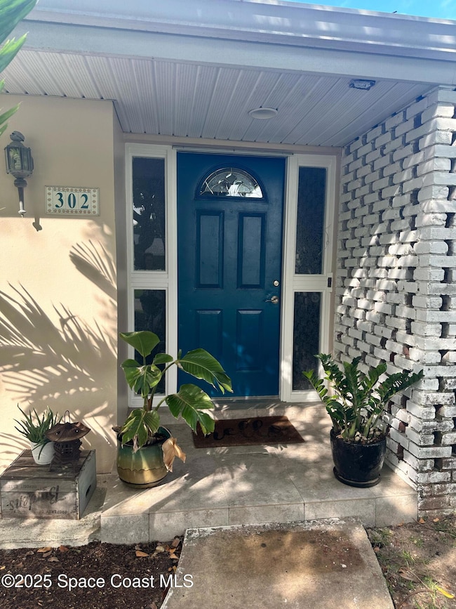 302 W Osceola Ln, Cocoa Beach, FL 32931 - photo 2