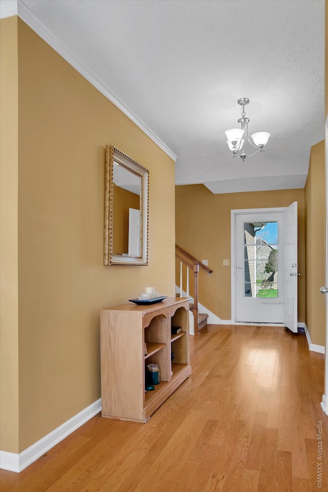 View of the entryway!  Steps lead to Bonus Room.