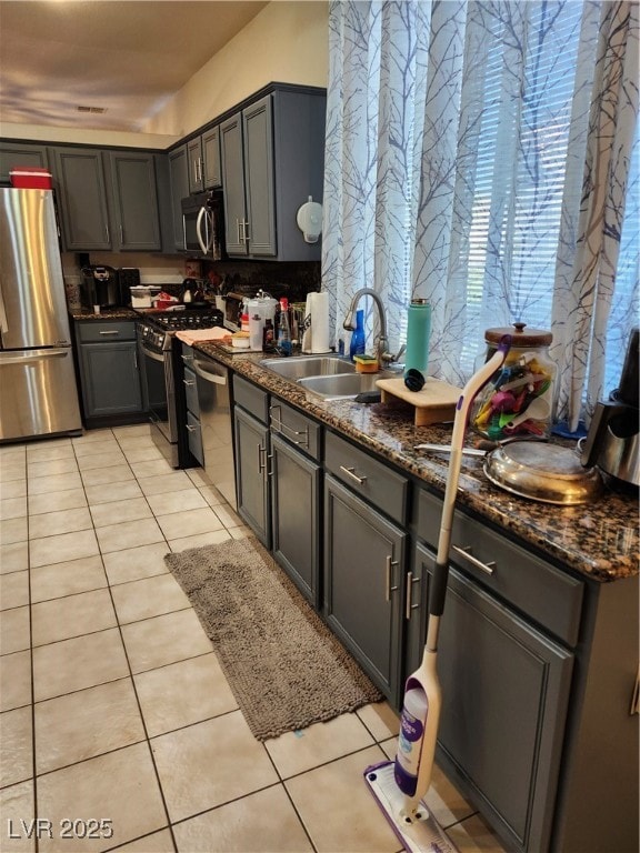 Kitchen featuring fridge, dishwasher, stove, and l