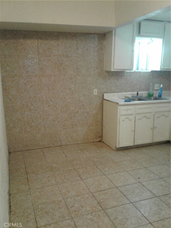 Front house view into kitchen
