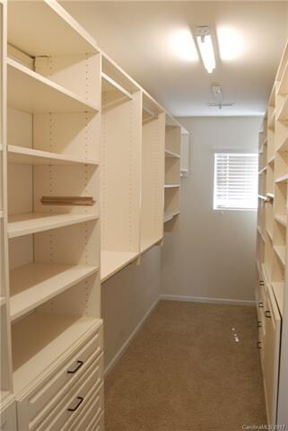 Master suite closet w/ built in shelving/ organize