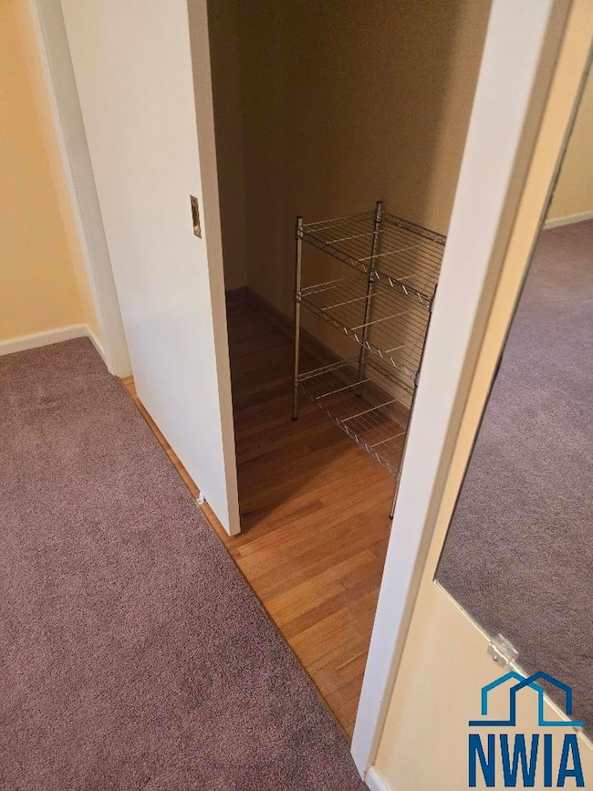 Showing wood floor that appears to run throughout the main level (except kitchen)