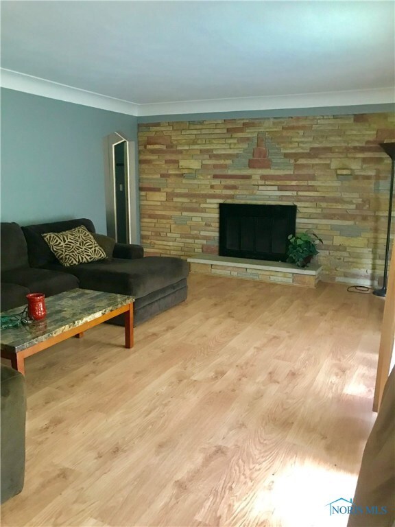 Living Room w/ wood burning fire place