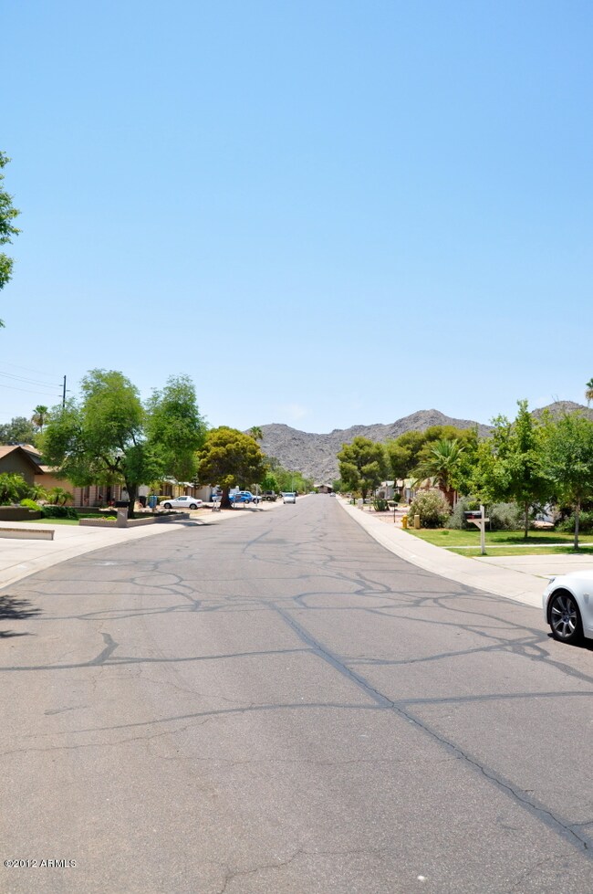 Wide streets with mountain views.