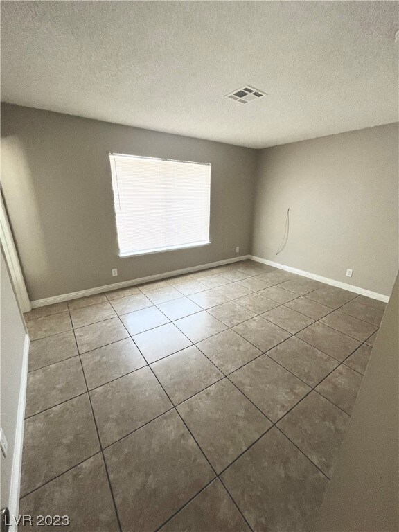 Living room with big front window plus a view of t