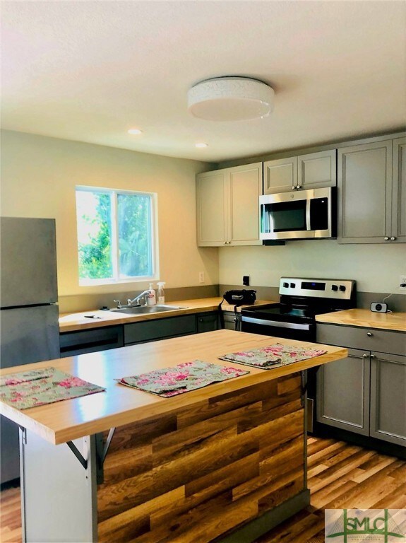 Brand new kitchen with island that can seat 3-4 pe