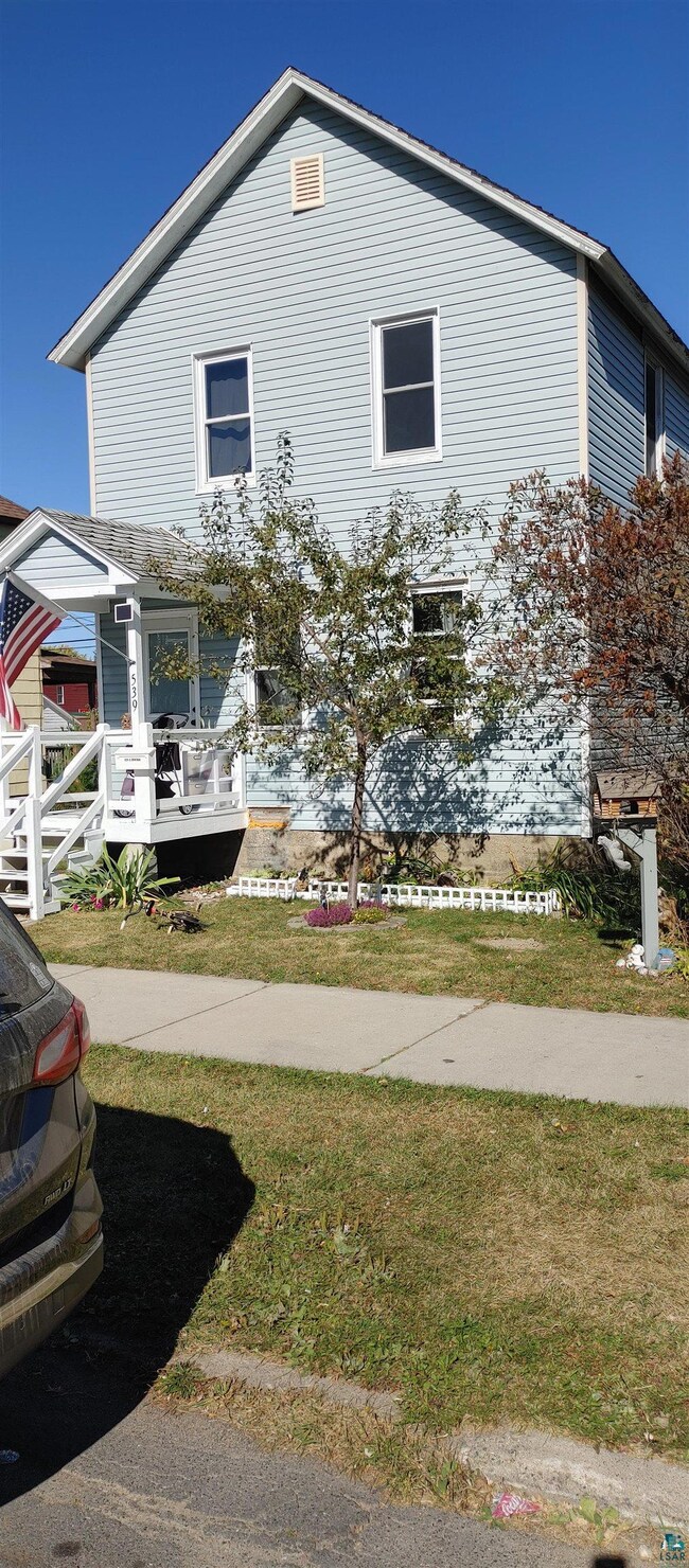 View of front of home with a front yard