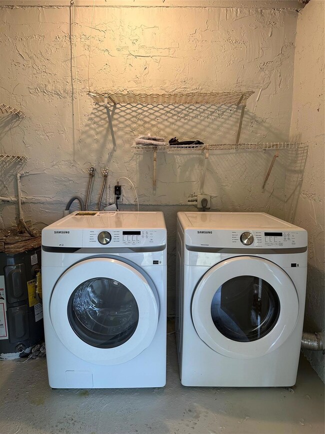 Brand new front load washer & dryer.  Kitchen features stainless steel refrigerator, new microwave oven and new dishwasher.