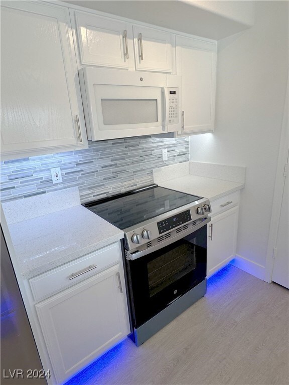 Custom tile backsplash and new range