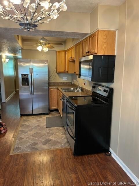 Upstairs kitchen includes the refrigerator, dishwa