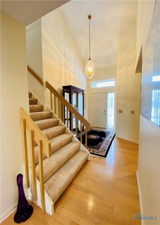 Entry with hardwood floor