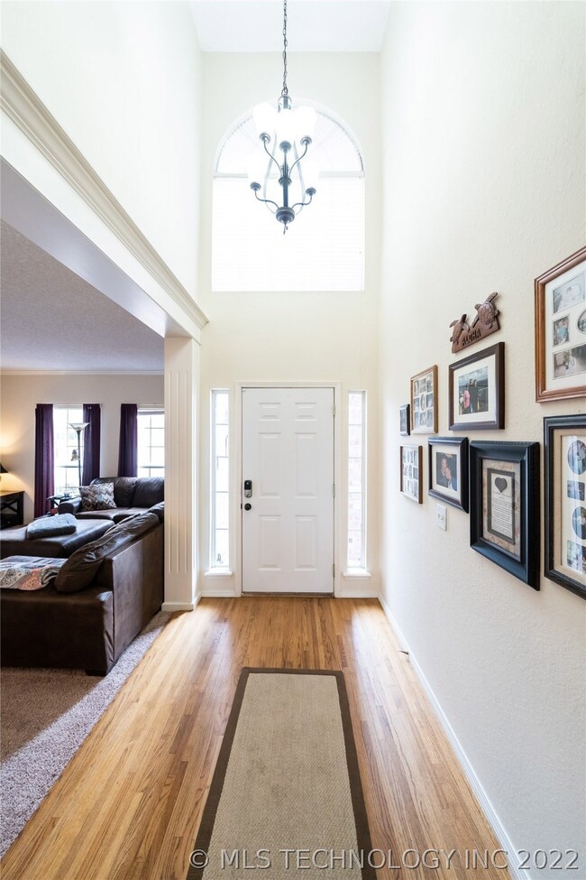 Dramatic two story foyer bathed in natural light!