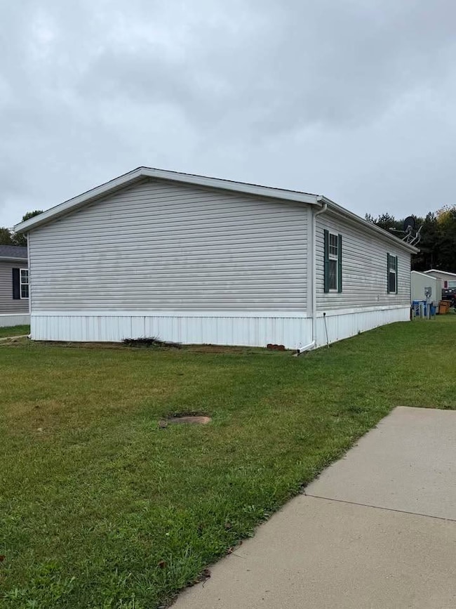 1317 Sugar Tree Blvd unit 118, Caro, MI 48723 - photo 3