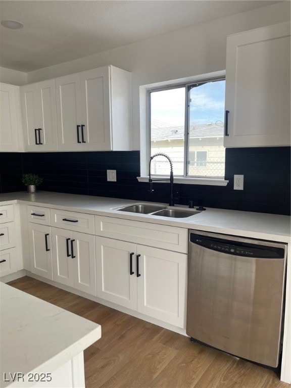 Kitchen with decorative backsplash, light countert