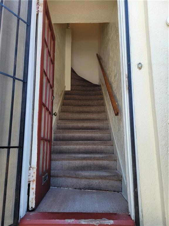 Stairs to upper apartment