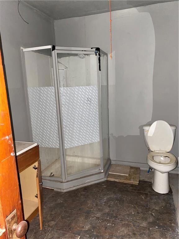 Bathroom with walk-in shower and cabinet