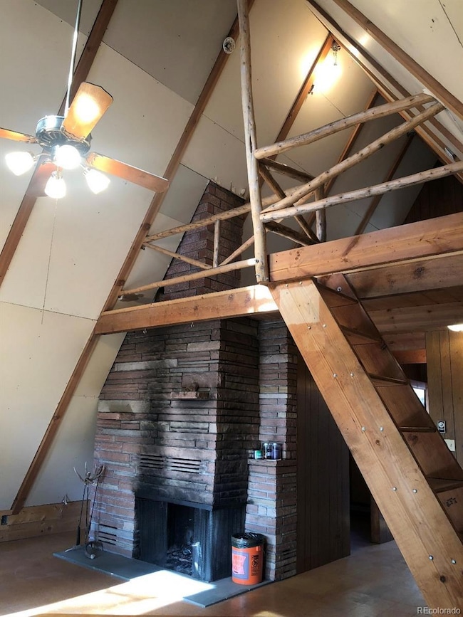 Great room with fireplace up to Loft