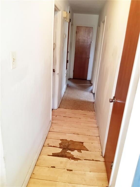 Hallway leading  to the 3 bedrooms. (Also has some storage  closets)